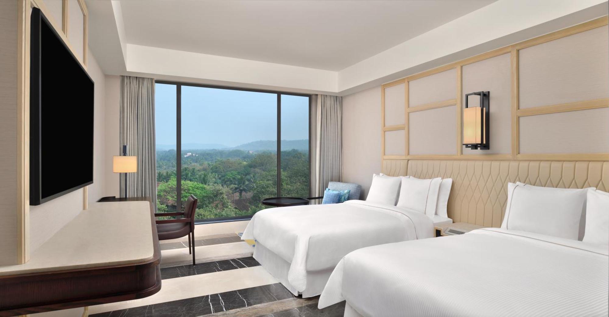 Forest View, Deluxe Guest room, 2 Double  - INR 1000 SPA Credit (Stay between Sunday to Thursday) - Complimentary beer on arrival and free shuttle to the beach