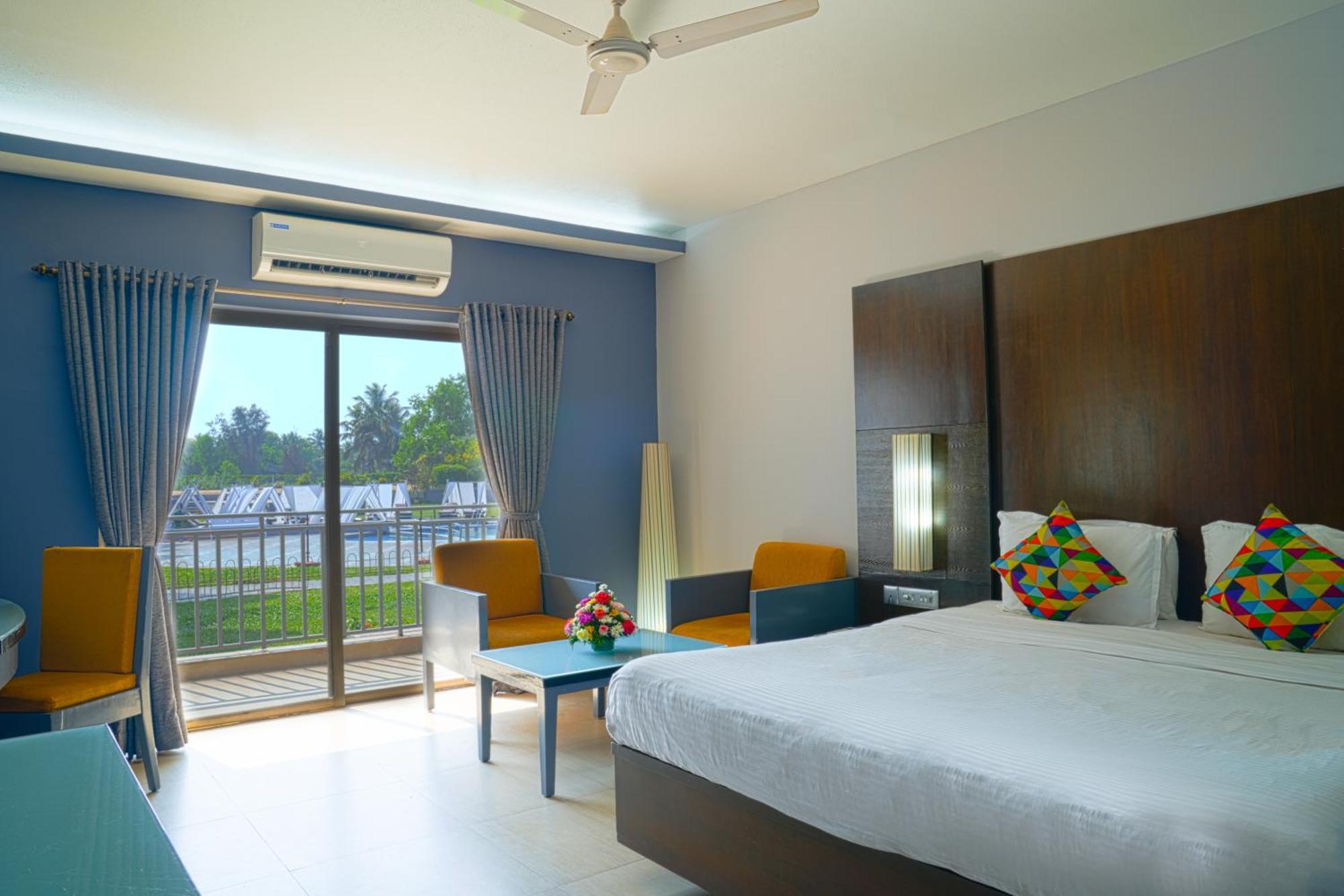 Deluxe pool view room with balcony